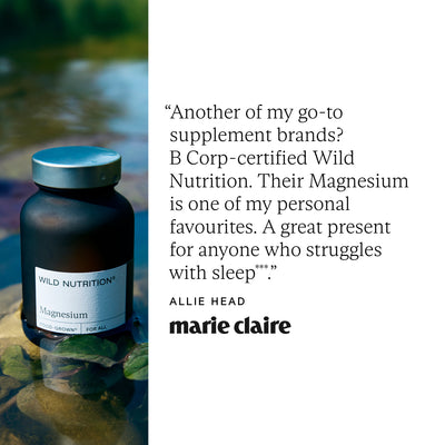 Wild Nutrition magnesium supplement bottle with a quote from Allie Head of Marie Claire on a blurred natural background