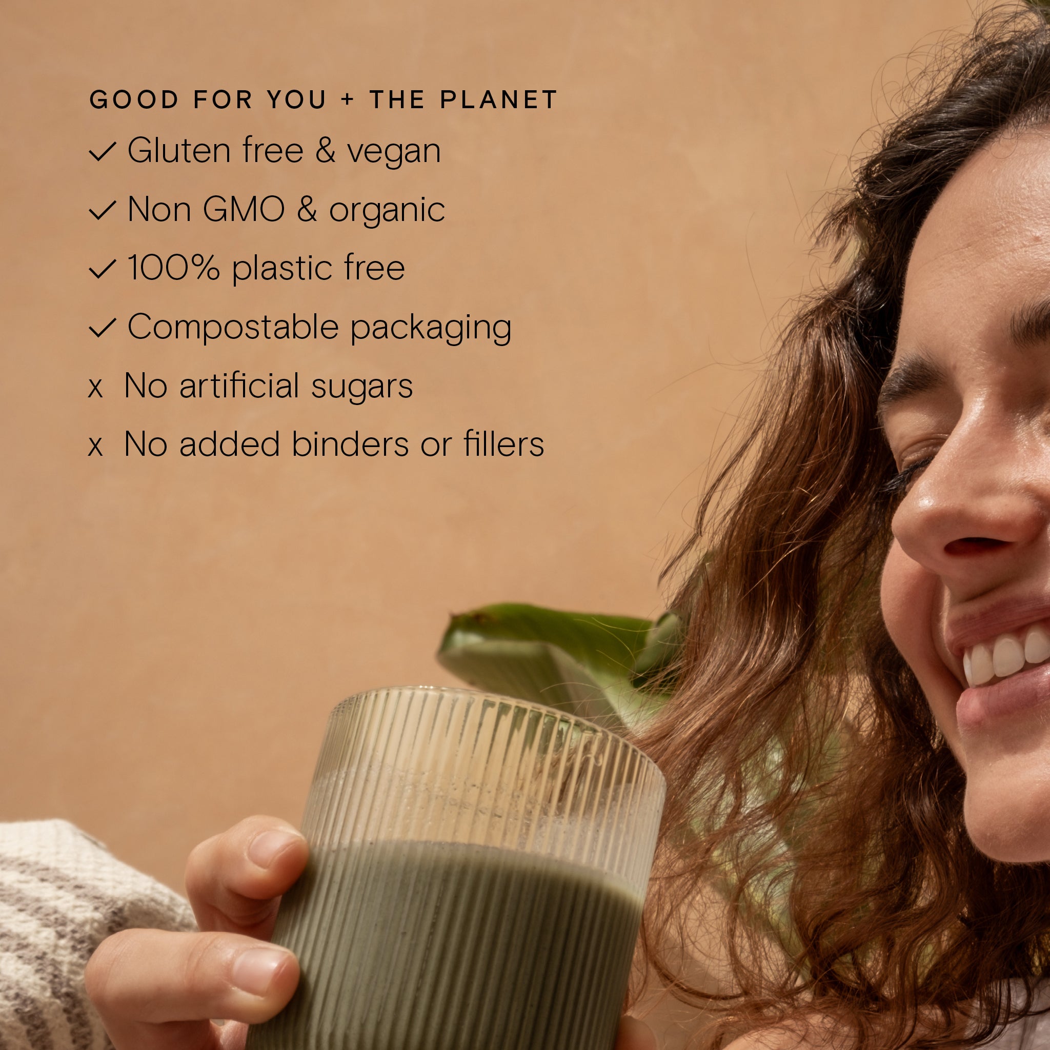 Smiling woman enjoying a green drink, highlighting product benefits: vegan, organic, plastic-free, and compostable packaging.