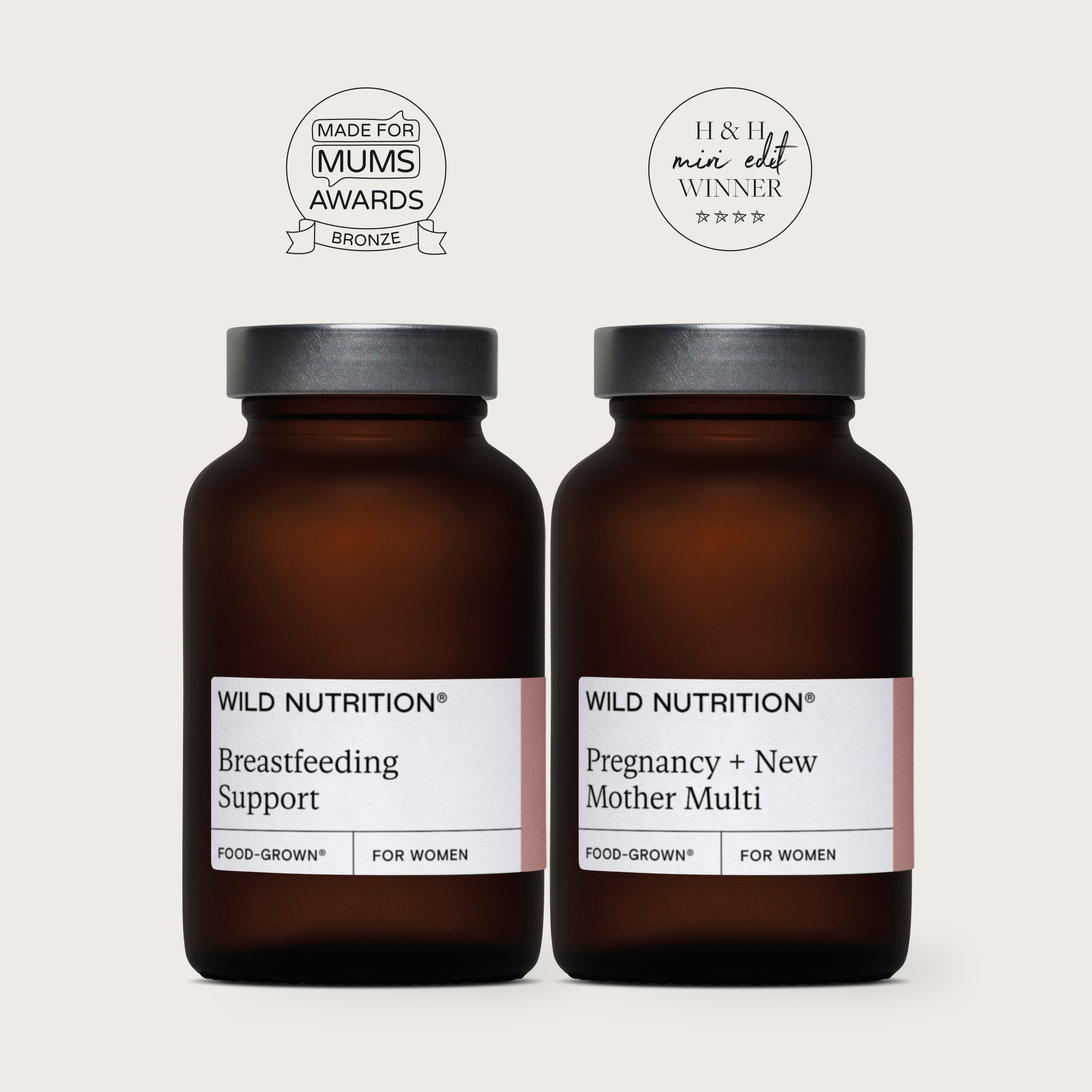 Wild Nutrition Breastfeeding Support and Pregnancy + New Mother Multi supplements in dark glass jars.