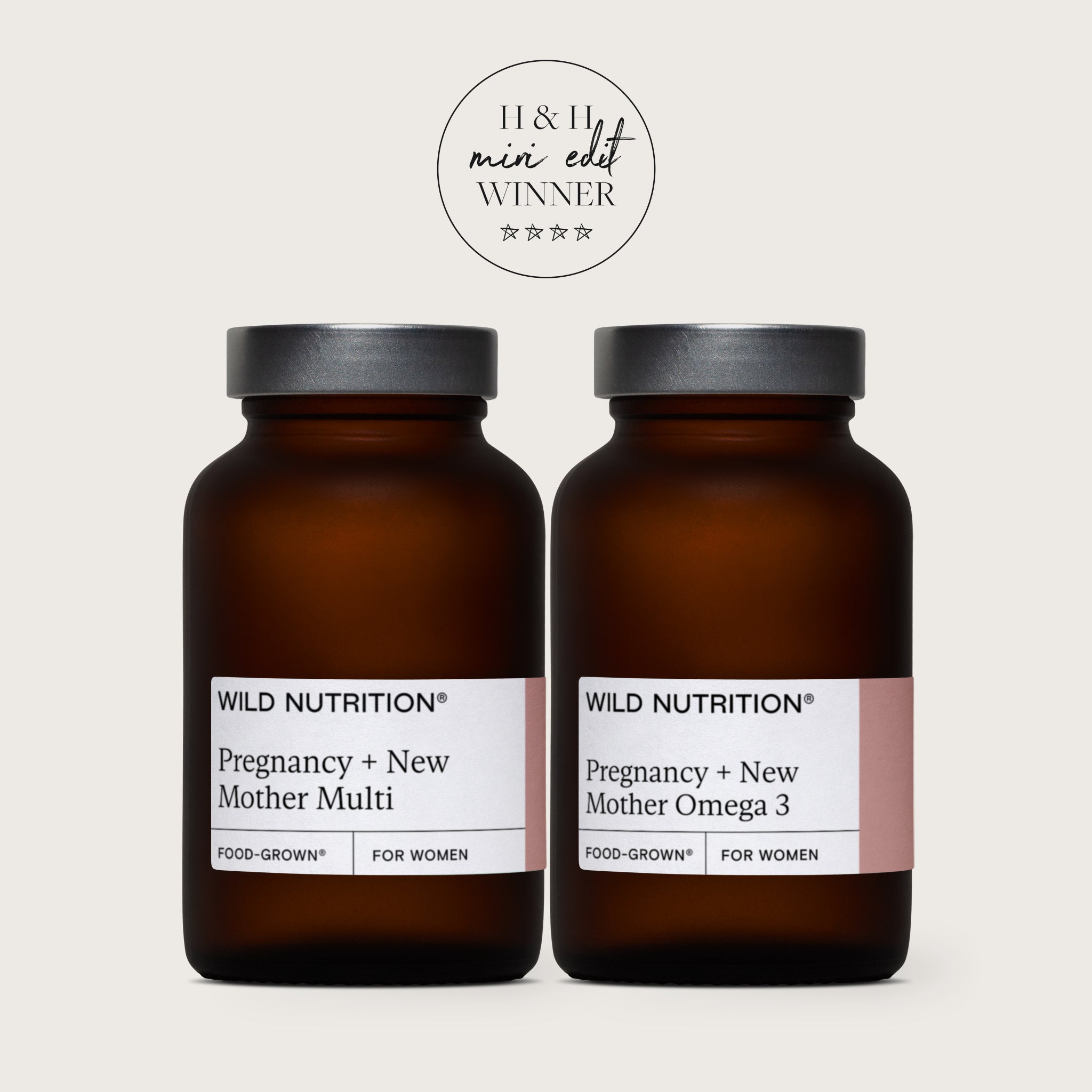 Wild Nutrition Pregnancy + New Mother Multi and Omega 3 duo in amber bottles for maternal and fetal health support.