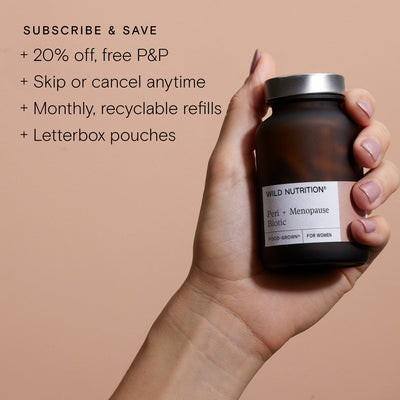 Hand holding Wild Nutrition Peri + Menopause Biotic bottle with subscription benefits and recyclable pouch details.