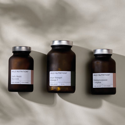 Wild Nutrition Perimenopause Support Trio including Daily Multi Nutrient, Pure Strength Omega 3, and Perimenopause Complex.