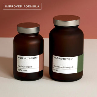 Wild Nutrition Women's Fertility Duo with improved formula, featuring Fertility Support and Pure Strength Omega 3 bottles.