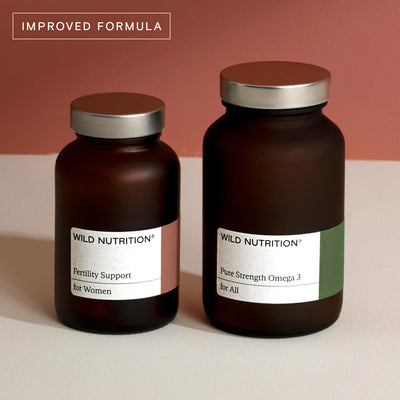 Wild Nutrition Women's Fertility Duo with improved formula, featuring Fertility Support and Pure Strength Omega 3 bottles.