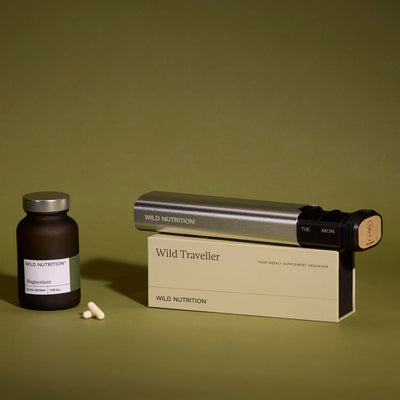 Wild Traveller organiser displayed next to Wild Nutrition KSM-66® Ashwagandha Plus supplement jar and capsules, highlighting product compatibility
