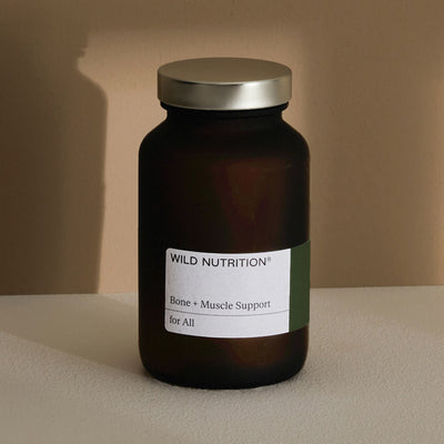 Menopause Support Trio featuring Bone + Muscle Support supplement by Wild Nutrition in amber glass jar.
