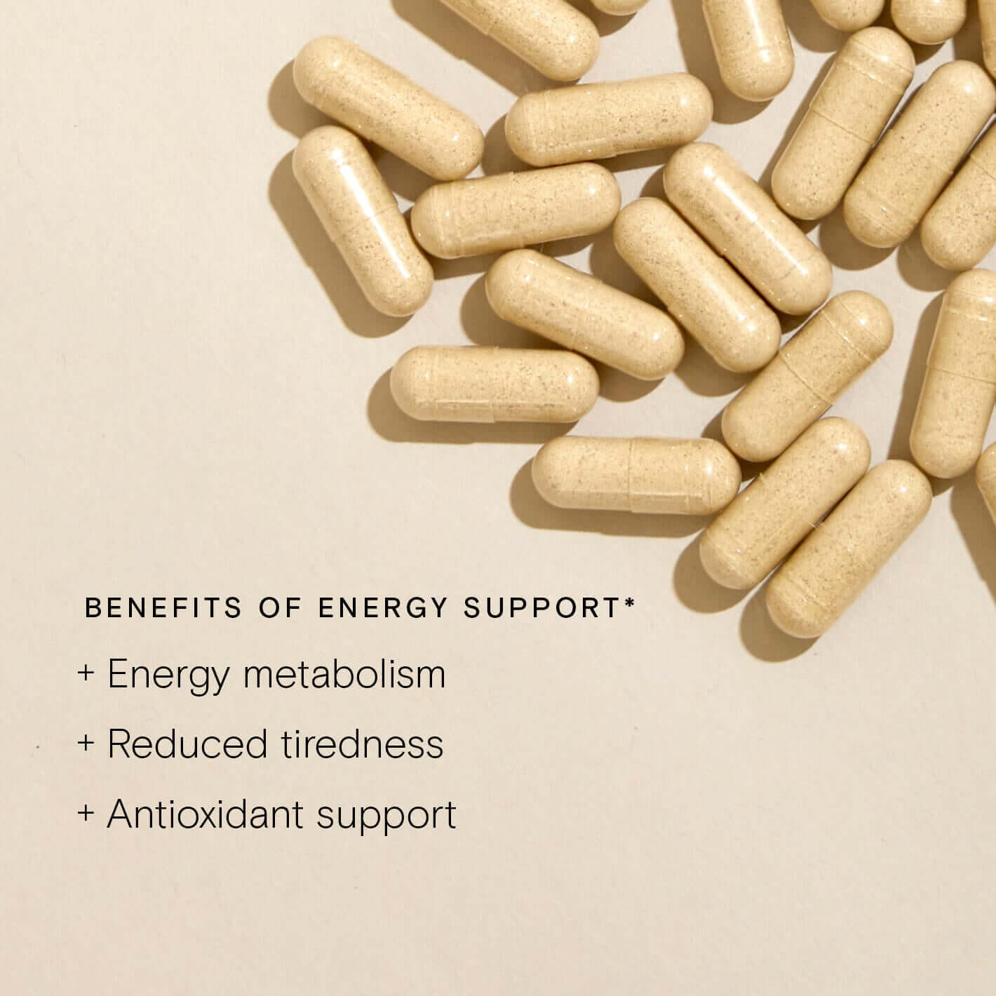 Pill capsules showcasing benefits of Energy Support: boosts energy metabolism, reduces tiredness, and provides antioxidant support.