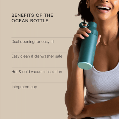 Woman holding Ocean Bottle highlighting its benefits: dual opening, easy clean, insulation, and integrated cup.